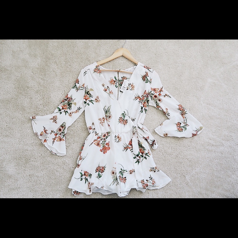 WHITE FLORAL SUMMER ROMPER NWT
